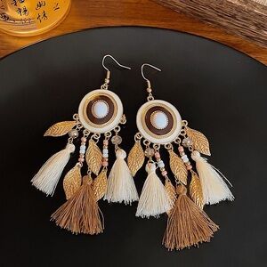 Elegant Gold and Cream Leaf Tassel Earrings
